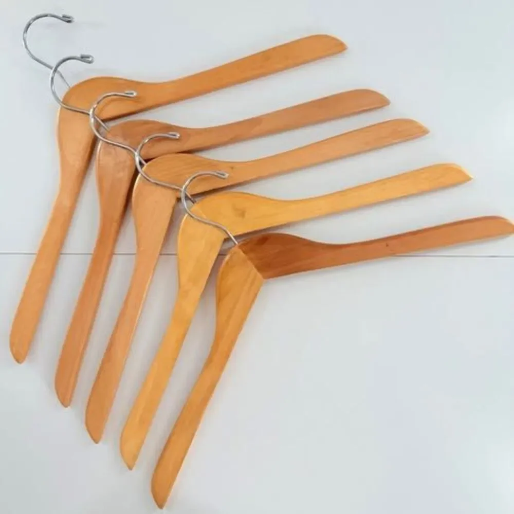 5 custom wood hangers with Jacksonville Jaguars branding.